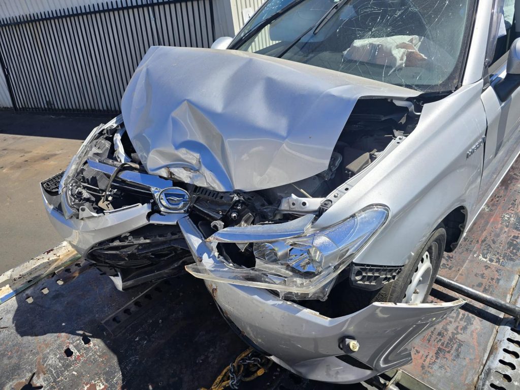 Damaged car being prepared for scrap car removal Perth service by AA Car Removals